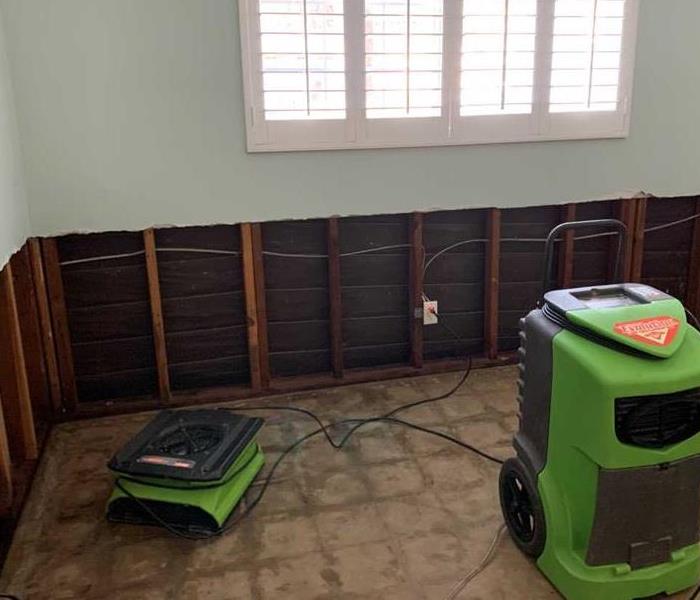 Baseboards and Flooring Removed After Damaged by Contaminated Water